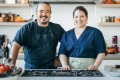 yabo亚博主页Good Food Kitchen主持Adam Liaw和Danielle Alvarez。
