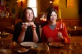 yabo亚博主页Good Food的Annabel Smith和Emma Breheny在Fitzroy North附近的葡萄酒中。